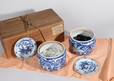 A PAIR OF BLUE AND WHITE SEA BEAST JARS