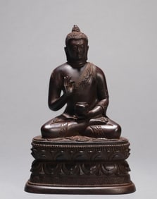 A BRONZE FIGURE OF BHAISHAJYAGURU BUDDHA