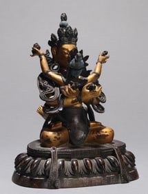 A GILT-BRONZE FIGURE OF MANJUSHRI