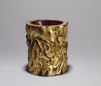 A WOOD FLORAL BRUSH WASHER