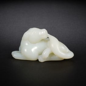 QING DYNASTY WHITE JADE DOG