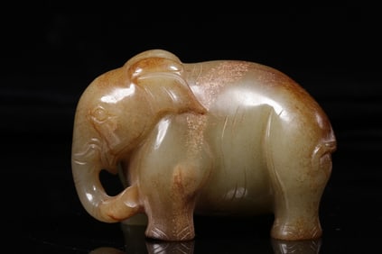 QING DYNASTY HETIAN YELLOW JADE AUSPICIOUS ELEPHANT HANDLE