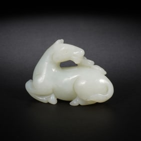QING DYNASTY WHITE JADE LYING HORSE ORNAMENT