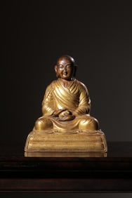 QING DYNASTY GILT BRONZE STATUE OF GURU BUDDHA SITTING