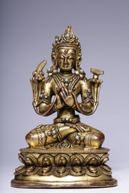 QING DYNASTY COPPER-GILT SEATED STATUE OF MANJUSRI BODHISATTVA