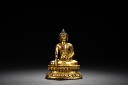 GILT BRONZE SEATED SHAKYAMUNI FIGURE