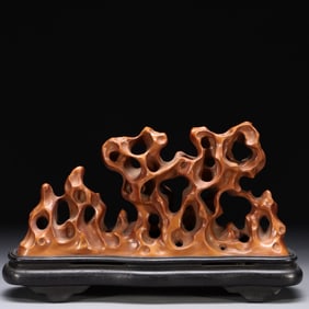 A PAIR OF HOLLOW TAIHU STONE ORNAMENTS MADE IN BOXWOOD