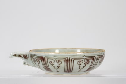 A YUAN DYNASTY YIXI WITH A BUNCH OF LOTUS PATTERNS IN GLAZE RED
