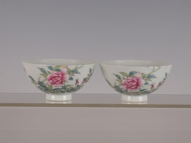 QING YONGZHENG PAIR OF POWDER COLOR PEONY PATTERN CUPS OVER THE WALL