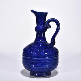 BLUE AND WHITE BLUE AND BLUE ENGRAVED FLORAL PATTERN FLOWER WATER JUG OF THE MING XUANDE PERIOD
