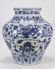 YUAN BLUE AND WHITE PORCELAIN JAR WITH AUSPICIOUS BEASTS AND PEONY VINES
