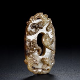 HETIAN JADE FIGURE OF A COILED DRAGON AND VERMILION BIRD