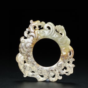 HETIAN JADE FIGURE OF A COILED DRAGON AND PHOENIX