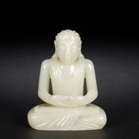 QING DYNASTY WHITE JADE SHAKYAMUNI SEATED STATUE