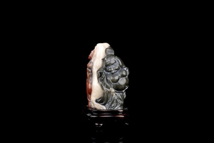 JADE CLEVERLY CARVED 'ZHU BAJIE' FIGURE
