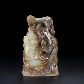 HETIAN JADE FIGURE OF A COILED DRAGON AND TIGER