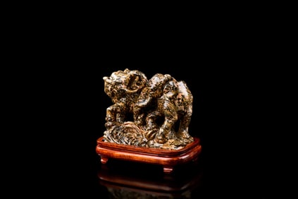 A STONE CARVING OF ELEPHANT