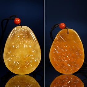 AMBER WITH SKIN GUANYIN PENDANT