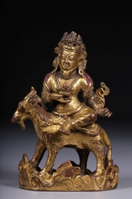 QING DYNASTY GILT COPPER RIDING SHEEP GUARDIAN