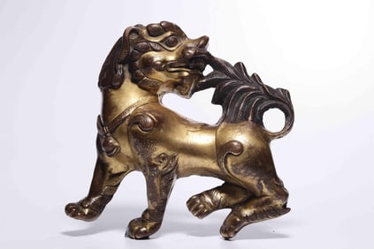 MING DYNASTY GILT COPPER SNOW LION PENDANT