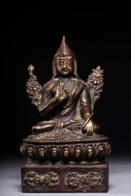 QING DYNASTY PARTIAL GILT COPPER SEATED TSONGKHAPA (WOODEN BASE)