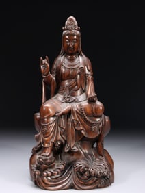 QING DYNASTY. SANDALWOOD CARVED GUANYIN SEATED STATUE