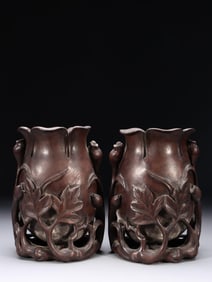 A PAIR OF AGARWOOD CARVED ORCHID FLOWER HOLDERS