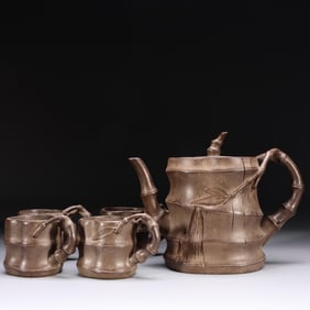 SHENGSI-MARKED PURPLE CLAY BAMBOO-PATTERNED RISING-STEP PURPLE CLAY POT SET