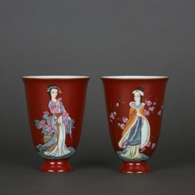 QIANLONG OF THE QING DYNASTY RED GROUND FAMILLE ROSE LADIES POETRY AND PICTURE CUPS PAIR