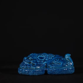 THE OLD COLLECTION OF QIANLONG SAPPHIRE BLUE GLAZE RUI BEAST PAPERWEIGHT