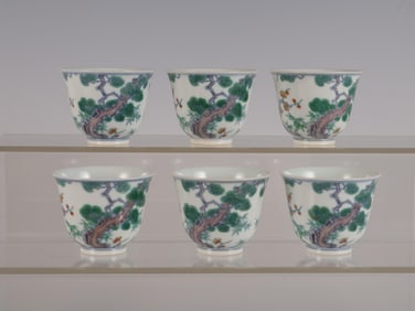 A SET OF QING YONGZHENG NEW YEAR DOUCAI SUI HAN SANYOU BELL CUPS
