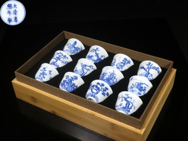 ?DA QING KANGXI NIAN ZHI? HAND-PAINTED BLUE-AND-WHITE FLORAL 12-CUP SET