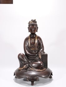 QING DYNASTY YONGLE REIGN MARK GILT-LACQUERED BRONZE SUTRA ROLLS GUANYIN SEATED STATUE