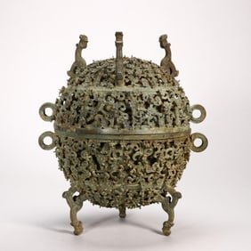 WARRING-HAN DYNASTY BRONZE OPENWORK PLUM?FLOWER-PATTERN TRIPOD VESSEL