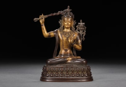 QING DYNASTY COPPER GILDED SWORD-WIELDING MANJUSHRI SITTING STATUE