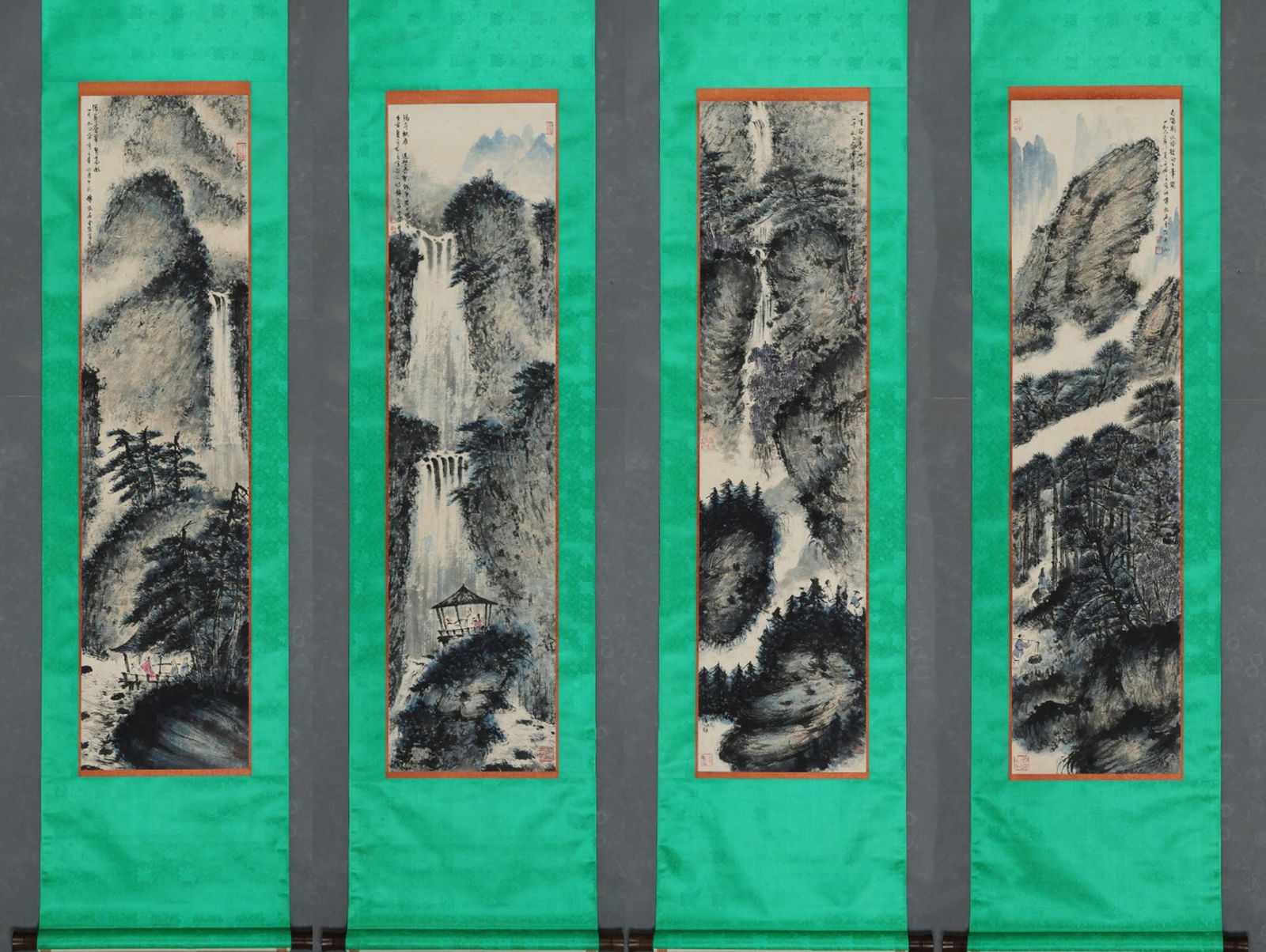 FU BAOSHI, A MOUNTAIN AND WATER VIEW OF A HIGH MAN, FOUR-PANEL VERTICAL SCROLL WITH FINE MOUNTING: 傅抱石 高逸游山观瀑图 四条屏 立轴 精装裱 Fu Baoshi, A Mountain and Water View of a High Man,
