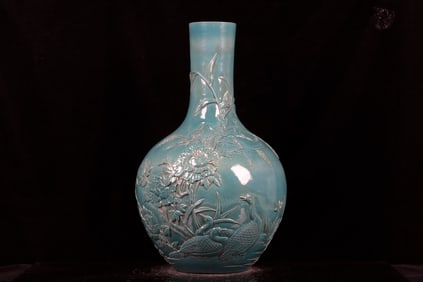MONOCHROME BLUE GLAZED AND CARVED ?FLOWERS'? VASE
