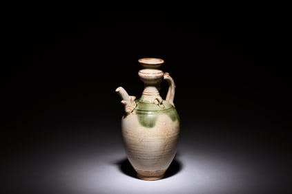 WHITE GLAZED EWER WITH SPLASH OF CELADON