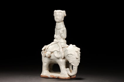 WHITE GLAZED 'CHILD AND ELEPHANT' FIGURE