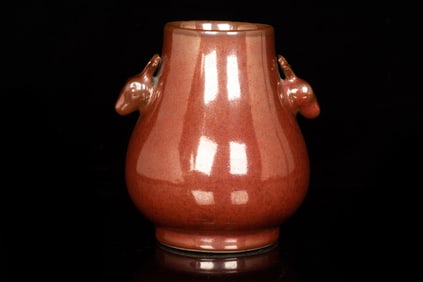 BROWN GLAZED JAR WITH DEER MASK HANDLES
