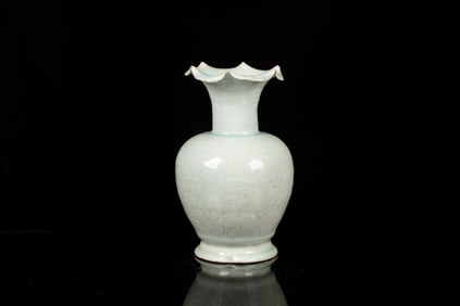 CELADON GLAZED AND CARVED VASE