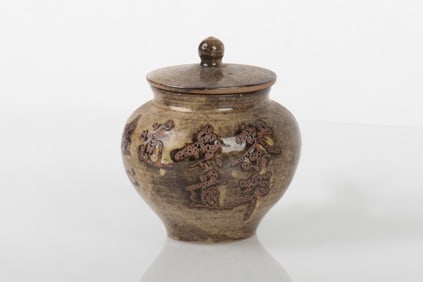 TEA DUST GLAZED AND CARVED TEA JAR WITH COVER