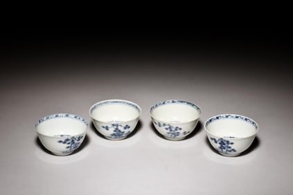 SET OF FOUR BLUE AND WHITE WINE CUPS