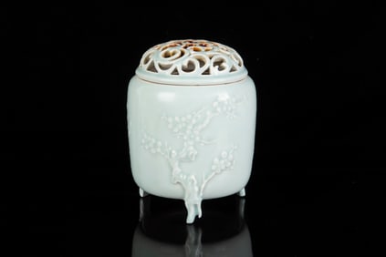 CELADON GLAZED AND IMPRESSED 'BAMBOO AND PLUM' TRIPOD INCENSE BURNER