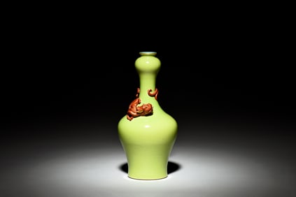 A CARVED YELLOW-GLAZED DRAGON VASE