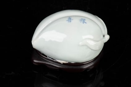 BLUE AND WHITE 'PEACH' FIGURE