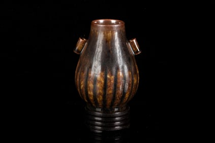 SMALL RUSSET-GLAZED MELON-FORM VASE WITH STAND
