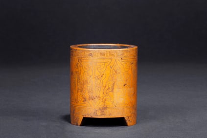A BRONZE SILVER-INLAID TRIPOD BRUSH POT