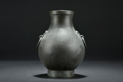 ARCHAIC BRONZE 'TAOTIE' RITUAL VESSEL WITH HANDLES