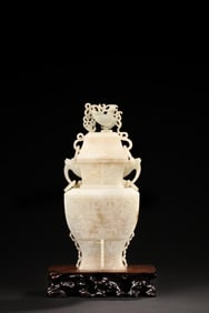 JADE CARVED VASE WITH COVER AND LOOPED HANDLES